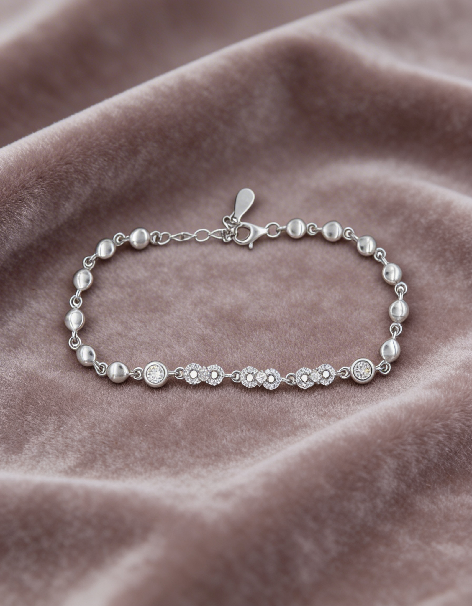 freepik__sterling-silver-bracelet-on-muted-velvet-tight-min__67077